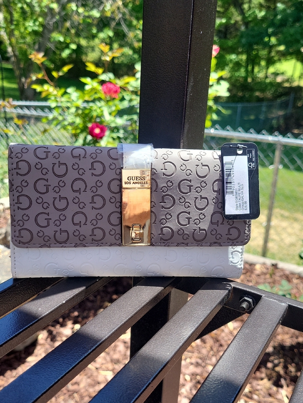 Guess Two-Tone Logo Clutch in Brown and Cream with Gold Hardware